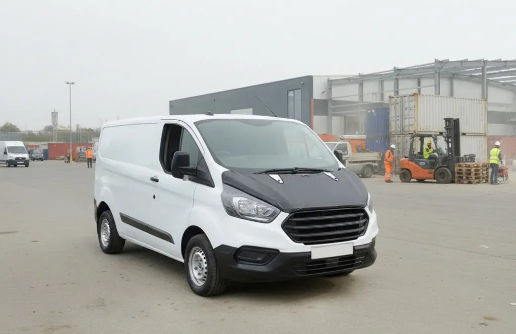Ford transit custom on a work sight with a full bonnet bra on protecting the bonnet of the van 