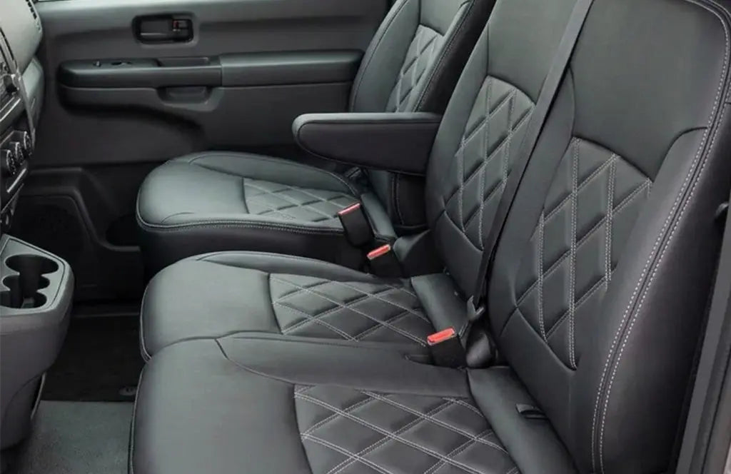 Nissan Primastar leatherette seat covers inside van close up