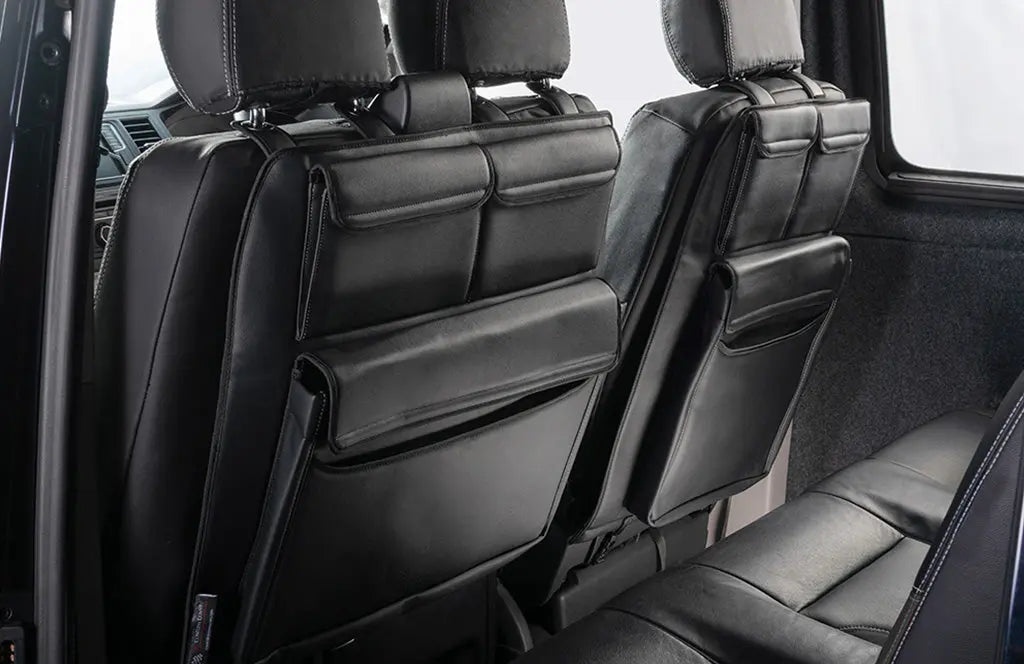 in the inside of a car with a double and single seat organisers 